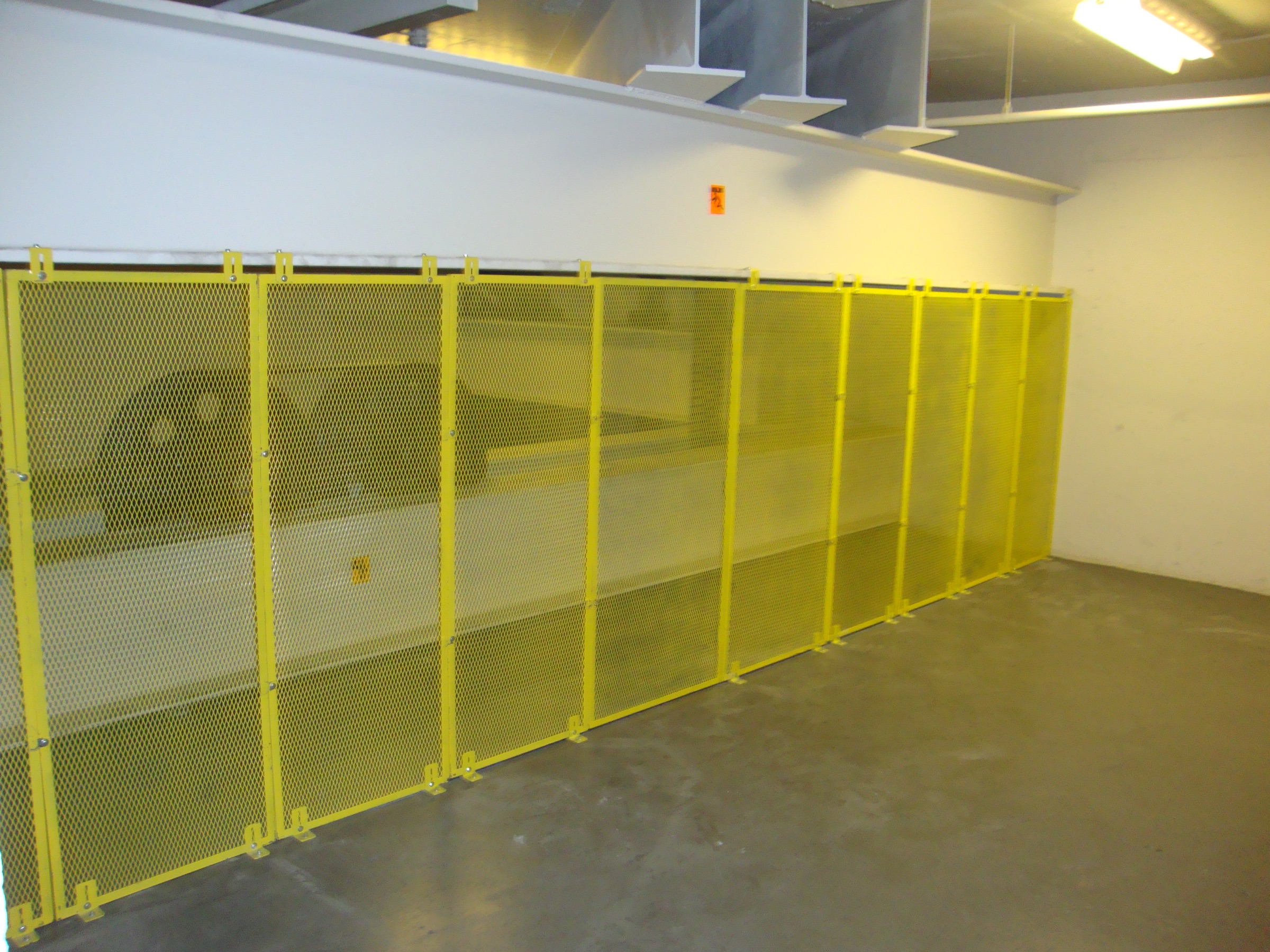 Expanded-metal mesh screen wall guarding machine room equipment